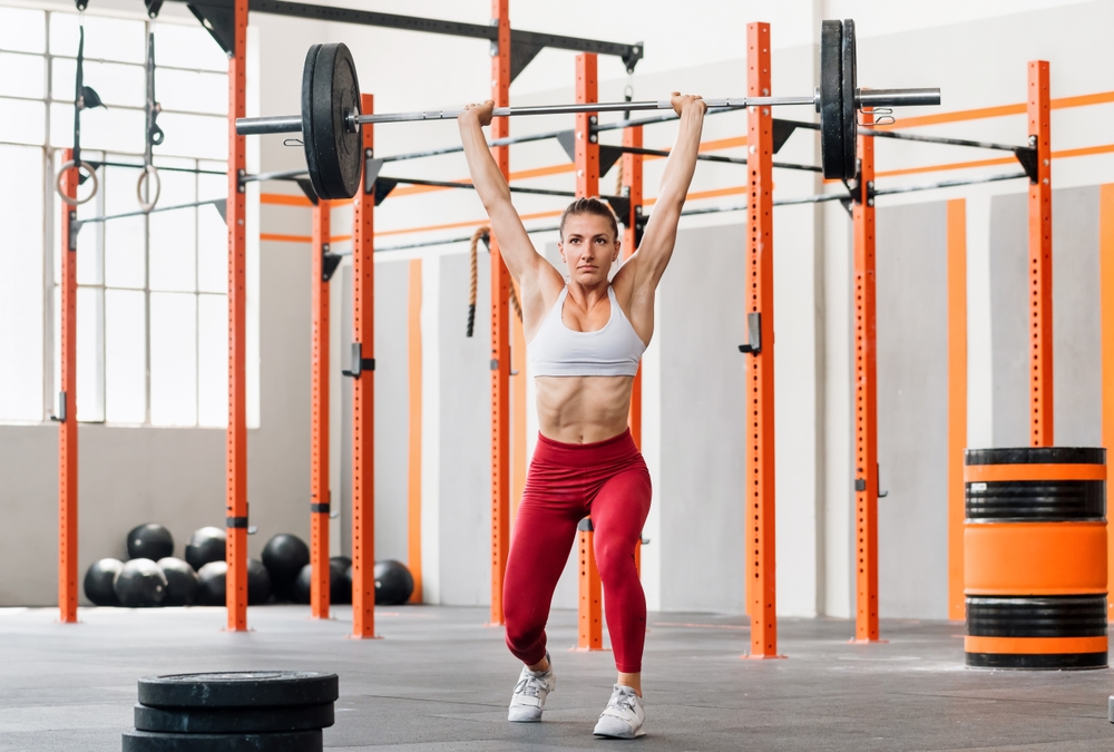 An athletic woman weightlifting